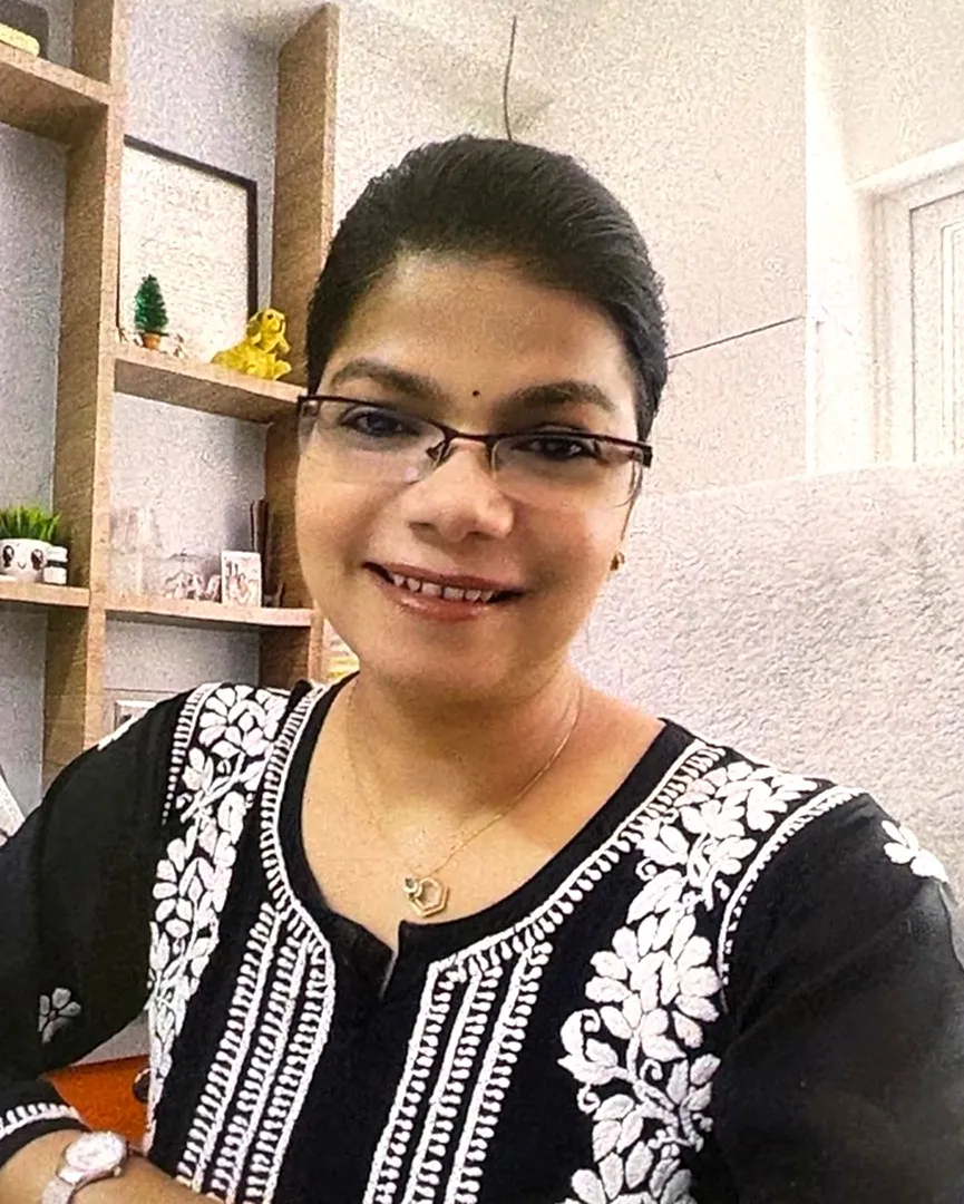 Dr. Mamta Verma, Consulting Pediatrician & Neonatologist, smiling in her clinic